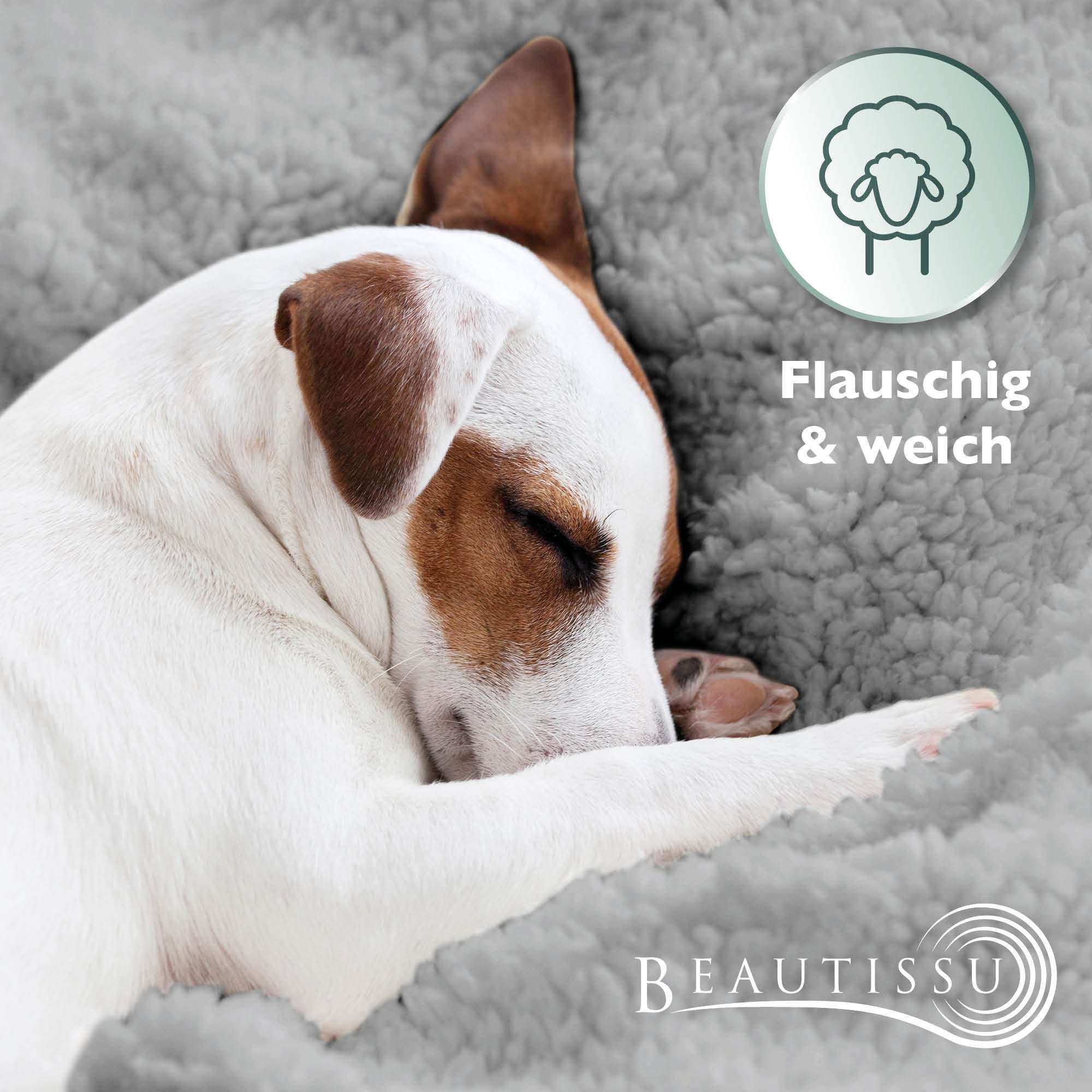 Dog sleeping on grey Sherpa fleece, showcasing the warm and fluffy texture of Beautissu Sherpa Kuscheldecke Alina blanket.