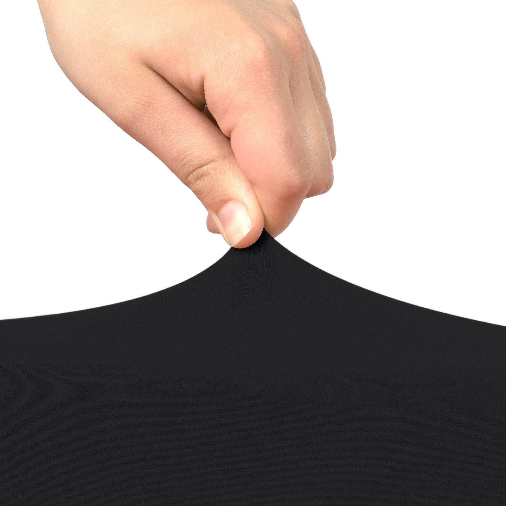 Hand pulling stretchable black chair cover fabric, part of Beautissu 4er Set.