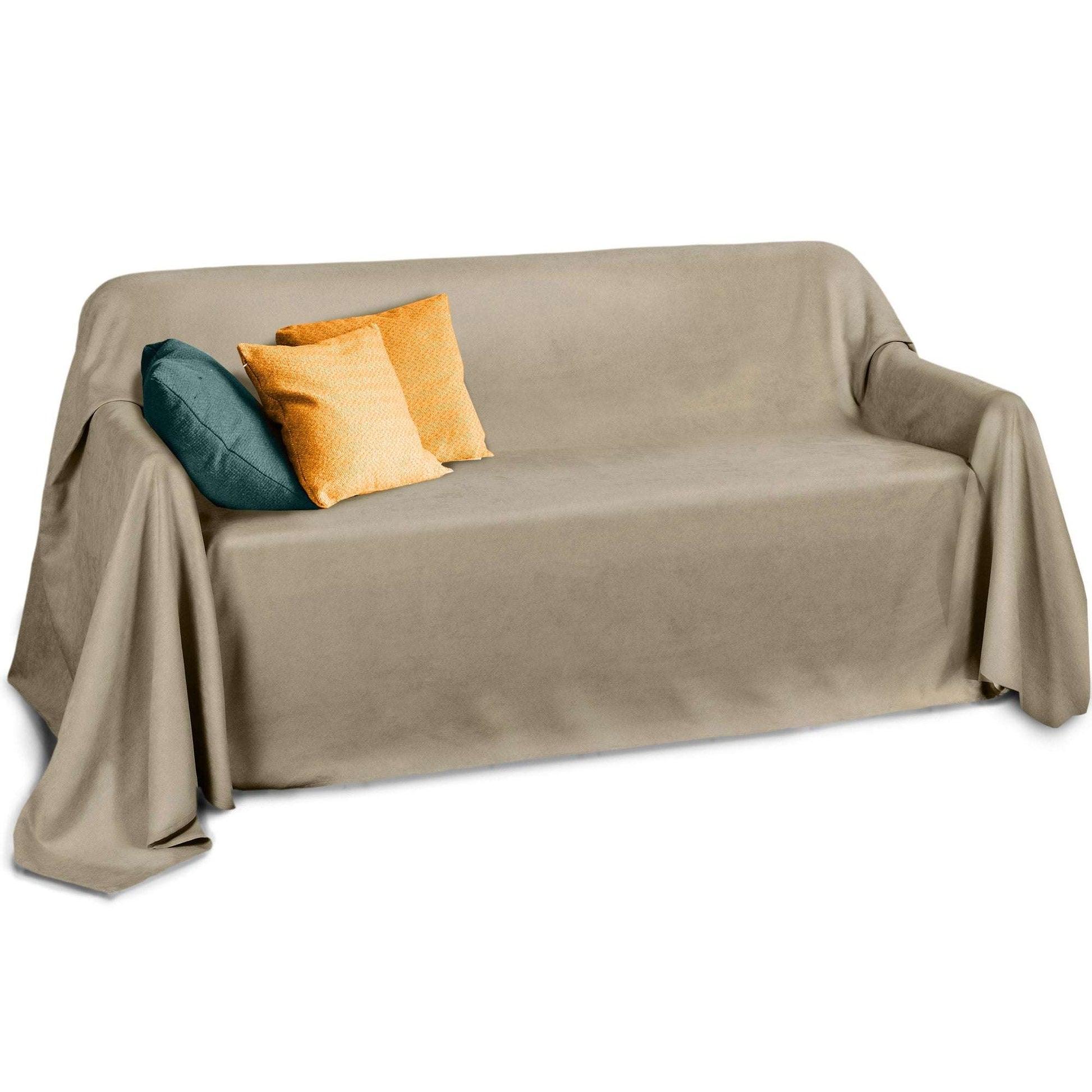Beautissu Tagesdecke Sofaüberwurf Romantica Wildlederoptik 210x280cm on a sofa with cushions.