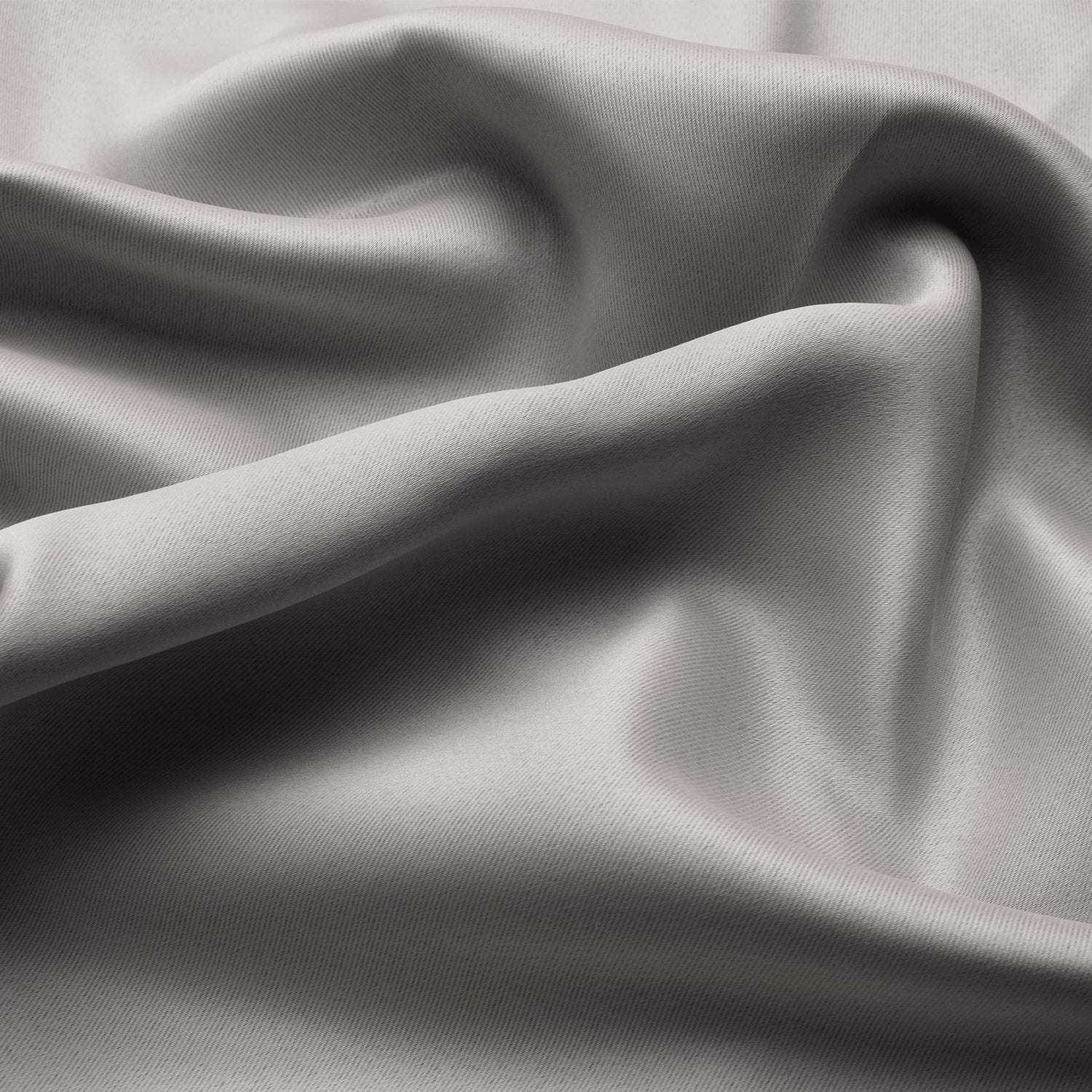 Beautissu Ösenschal Amelie blackout curtains, silver fabric with elegant folds and glossy finish.