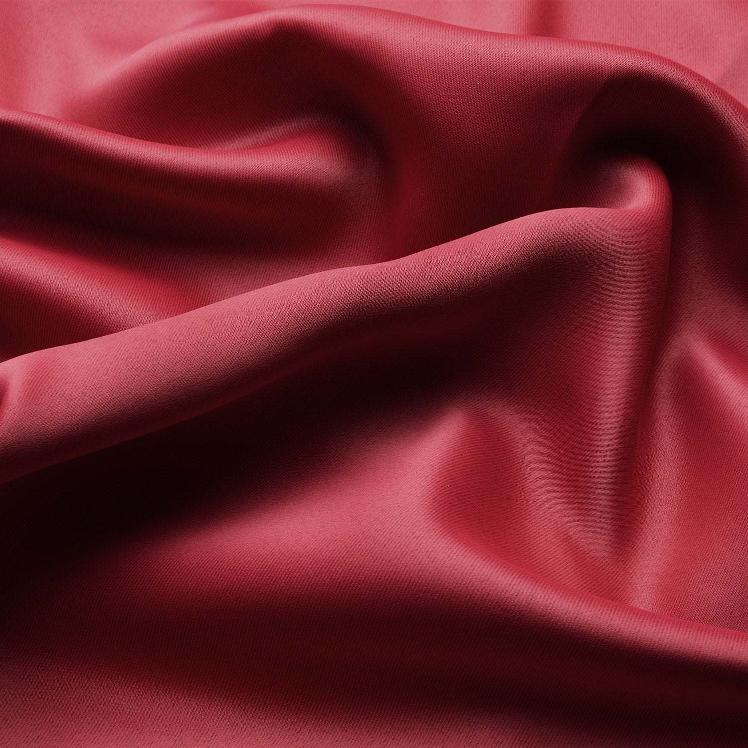 Beautissu Ösenschal Amelie blackout curtain fabric in red, showcasing luxurious folds and smooth texture.