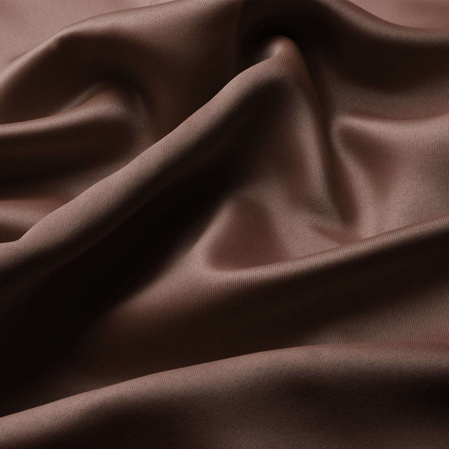 Luxurious brown fabric of Beautissu Ösenschal Amelie blackout curtain with elegant folds.