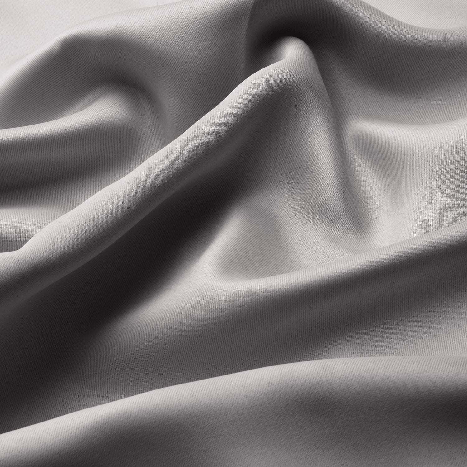 Beautissu Ösenschal Amelie blackout curtain, light grey fabric texture with smooth folds.