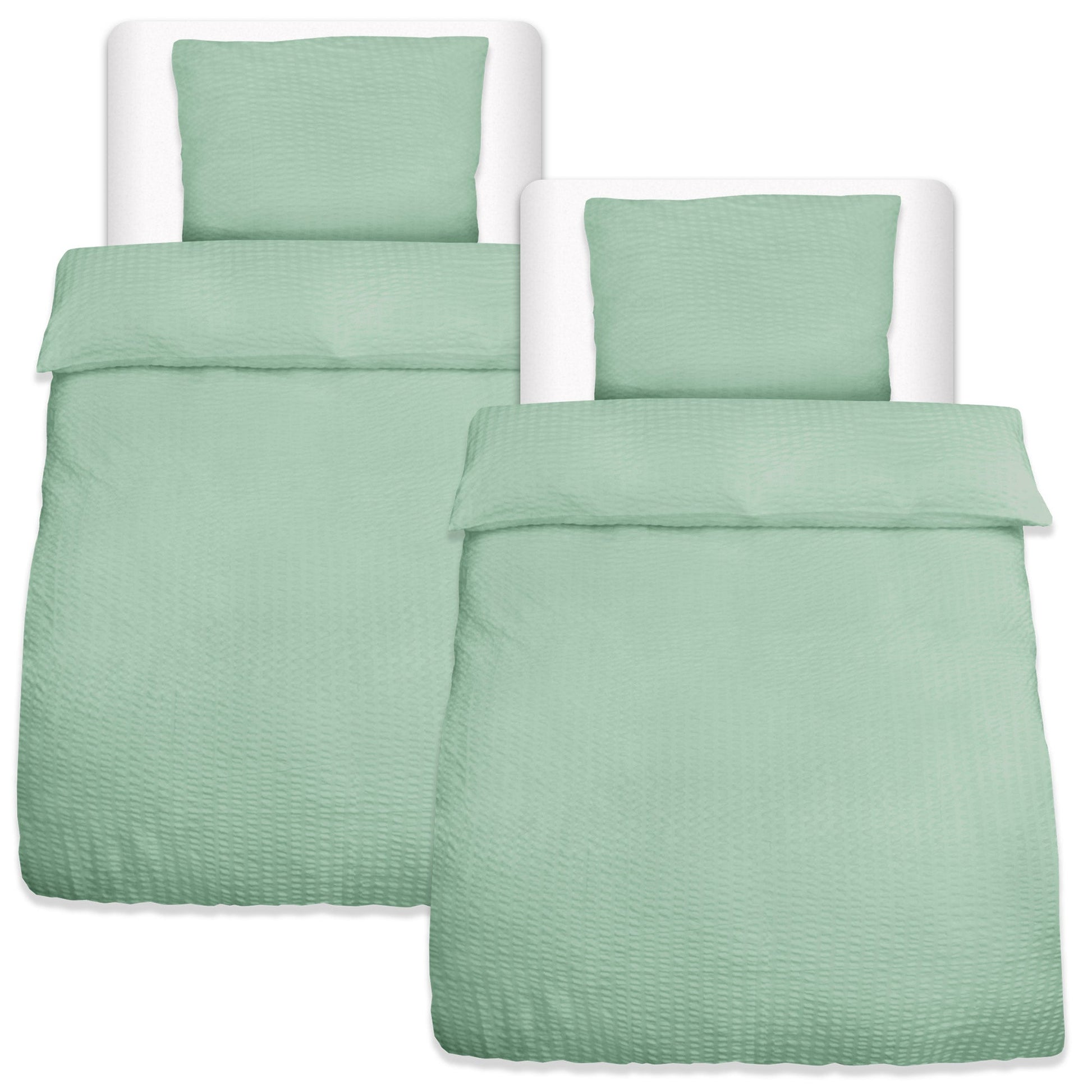 4-piece Beautissu Meline Seersucker bedding set with two duvet covers and two pillowcases in green.