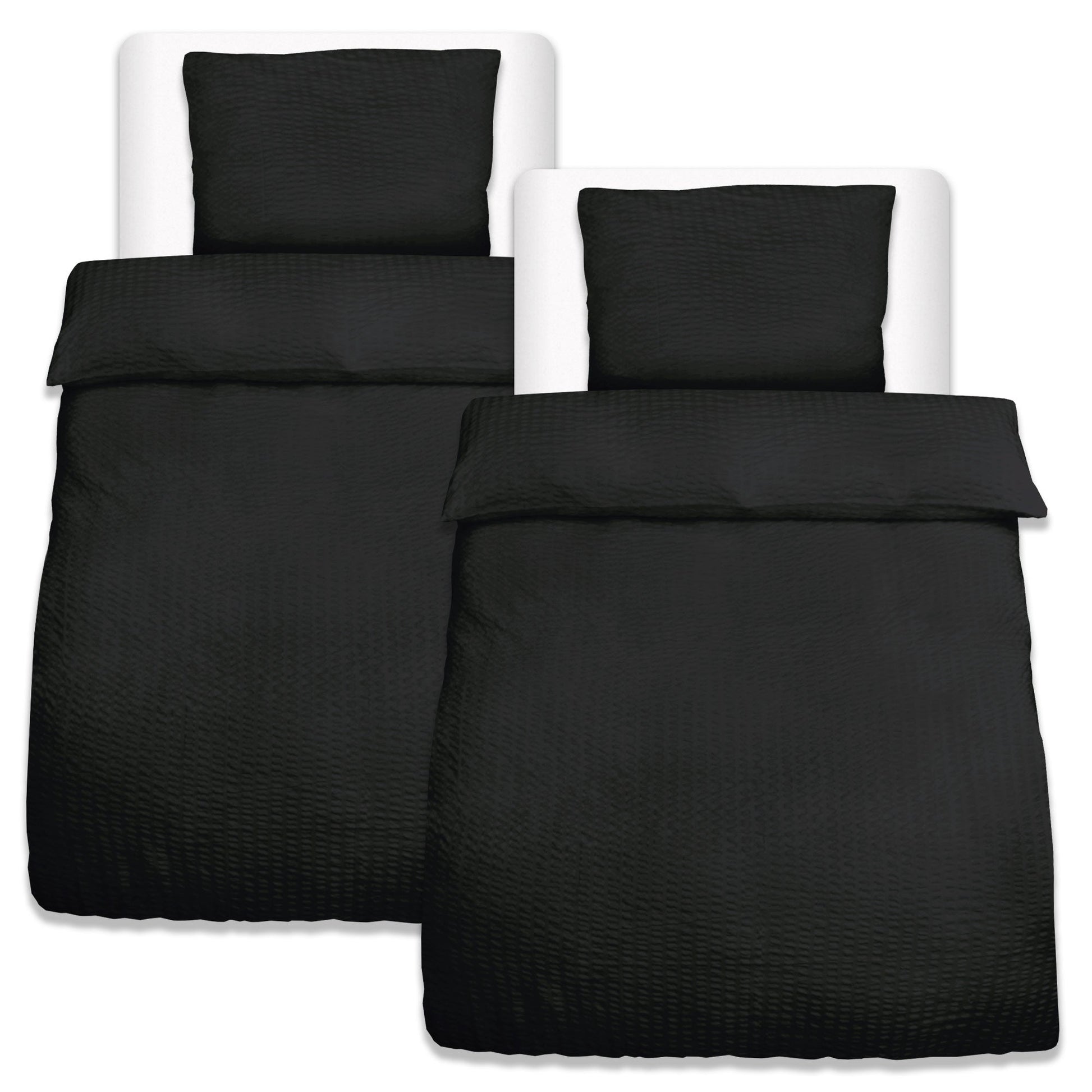 4-piece Beautissu Meline seersucker bedding set with two duvet covers and two pillowcases in black.