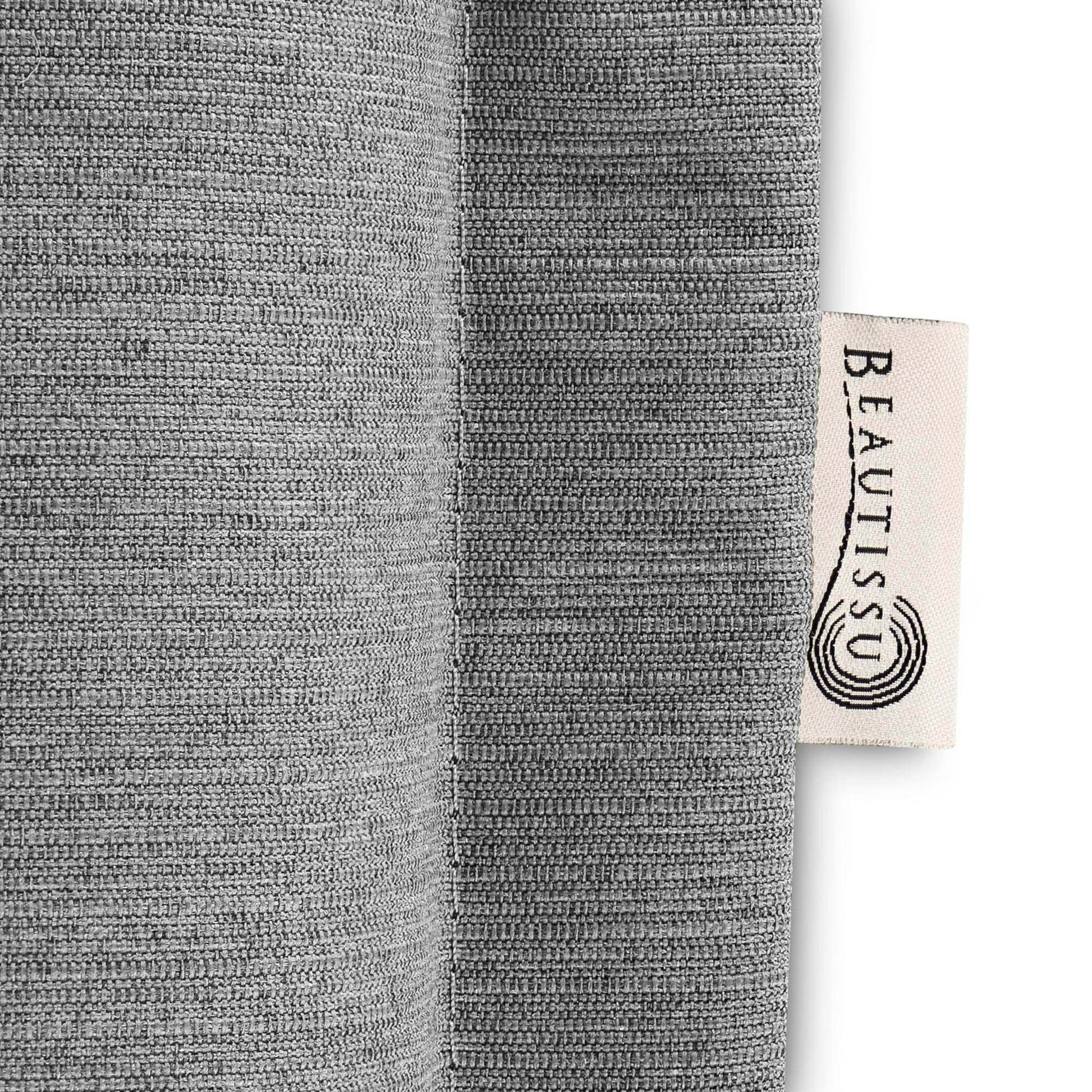 Beautissu HighLux HL garden chair cushion close-up with grey fabric and label.